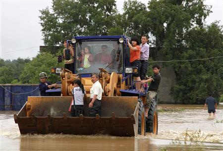 Torrential rains affected 680,000 people, toppled 6,744 homes and inundated 639 square kilometers of farmlands in China