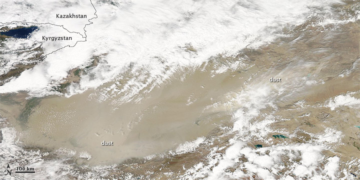 Dust and clouds blew over the Taklimakan Desert in western China