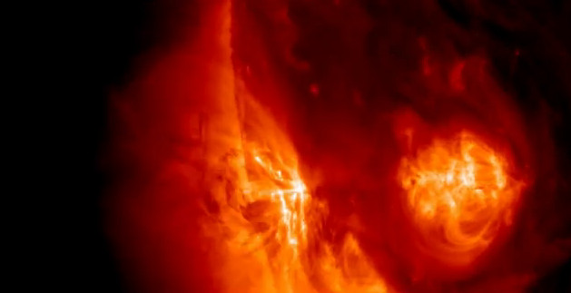 Huge coronal hole rotating to the Earth side – Solar Watch May 27, 2012