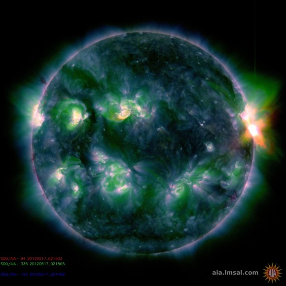 The M-class flare from AR 1476 on May 17, 2012 (at right) Courtesy NASA/SDO