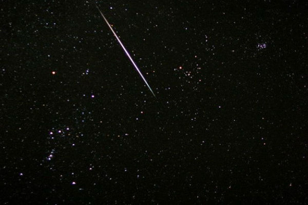 Credit: ©Dennis Mammana/dennismammana.comAstrophotographer Dennis Mammana caught a Geminid fireball streaking near the stars of Orion.