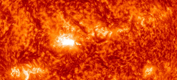 Large filament eruption and second moderate solar flare from Region 1875