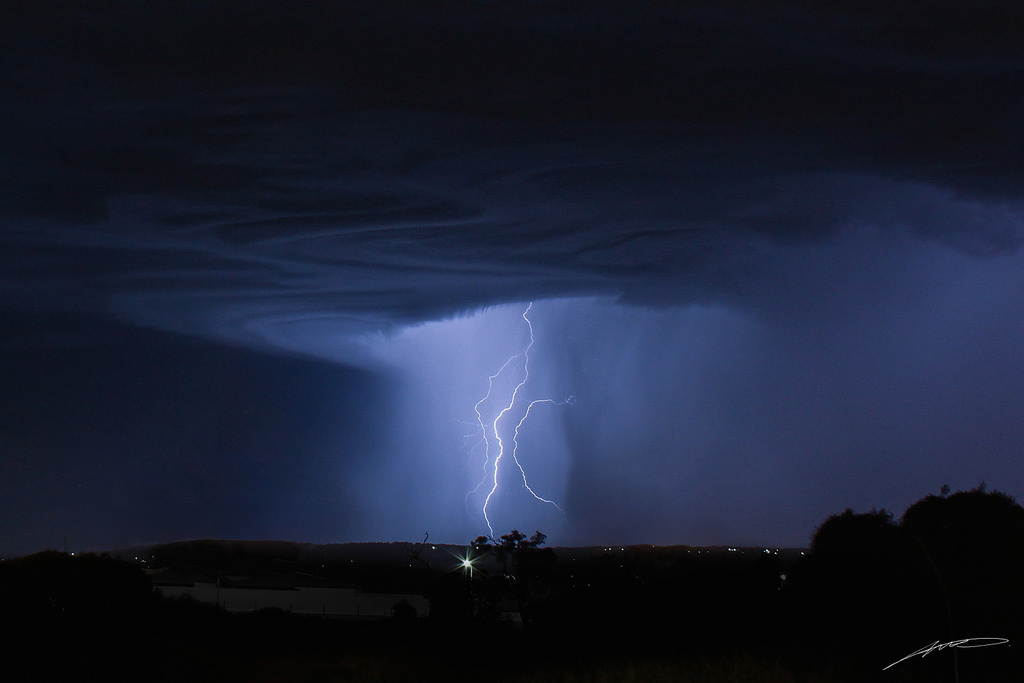 Inducing rain and lightning with high-energy laser beams