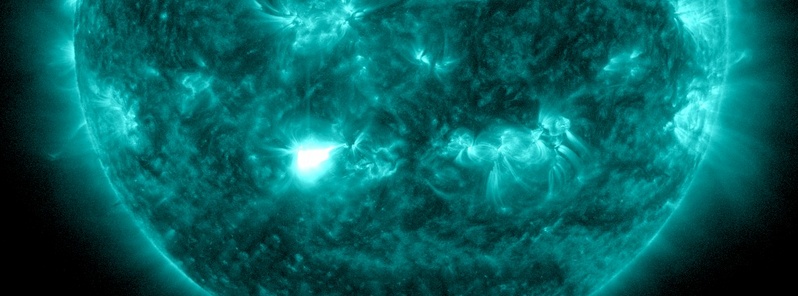 m1-8-solar-flare-erupts-from-central-region-2222