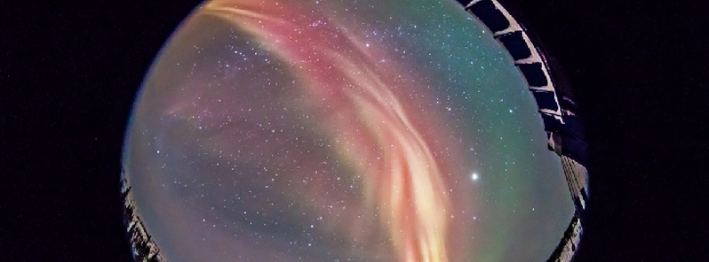 Surprising red aurora captured over Manitoba, Canada