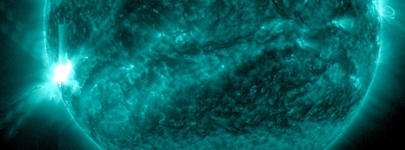 Strong, long duration M9.2 solar flare erupts from Region 2297