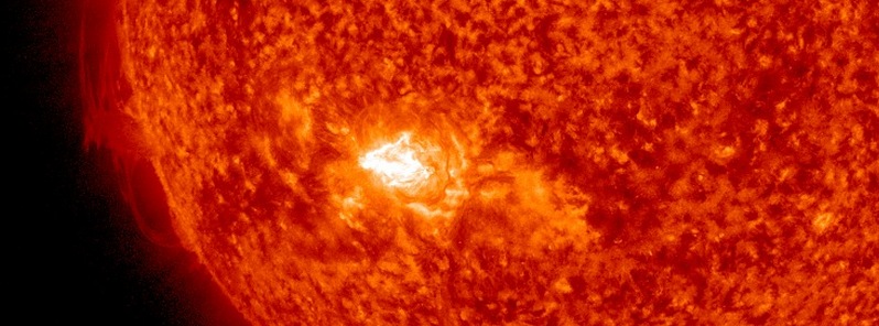 Third M-class solar flare of the day erupts from Region 2403: Long duration M1.1