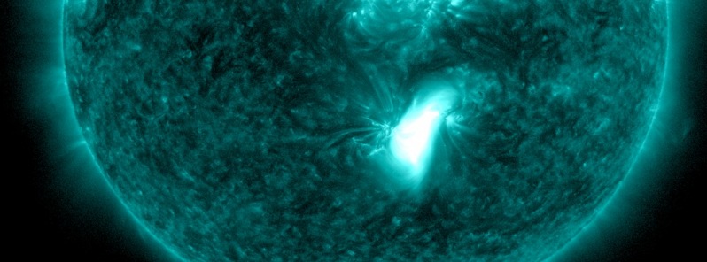 Long duration M1.8 solar flare produces a full halo, Earth-directed CME