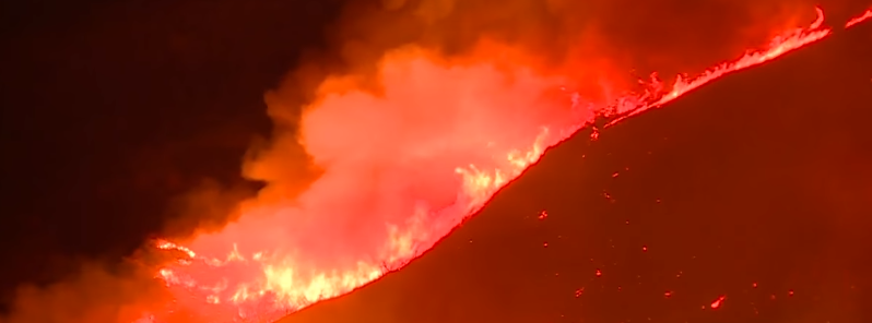Intense US heat wave breaks temperature records, sparks violent wildfires