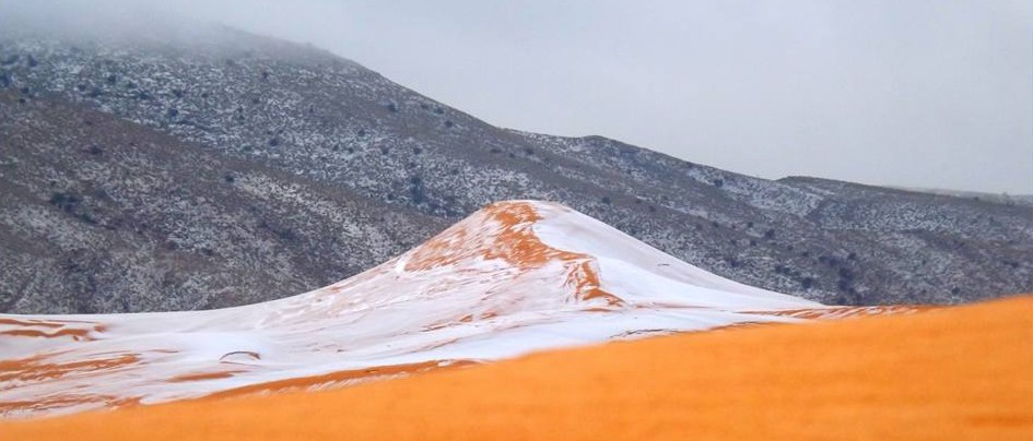 Rare snow covers sand dunes of Aïn Séfra, Algeria