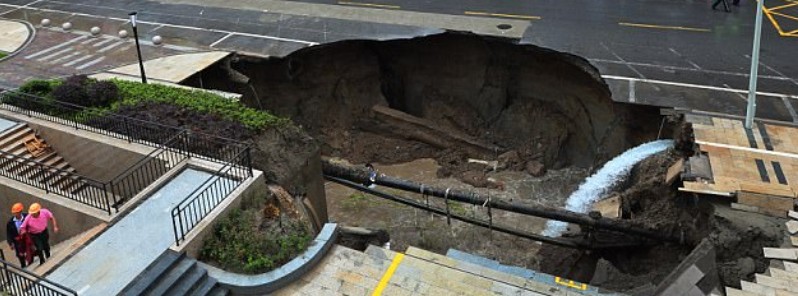 Large sinkhole opens in China’s Jiangsu, swallows a van and a tree