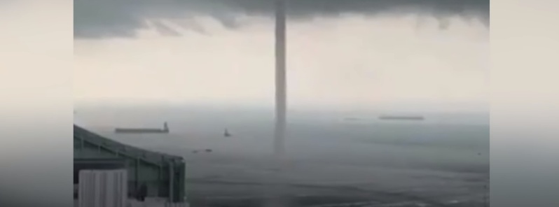 large-waterspout-forms-near-port-of-singapore