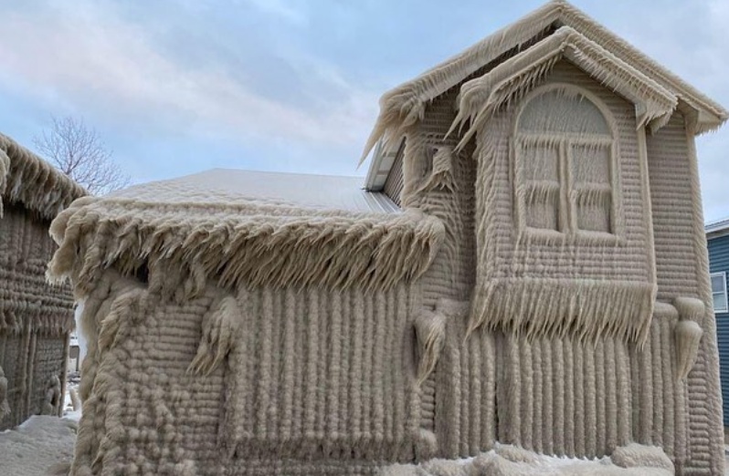 Intense lake effect snow wallops Upstate New York, encasing homes in a thick layer of ice