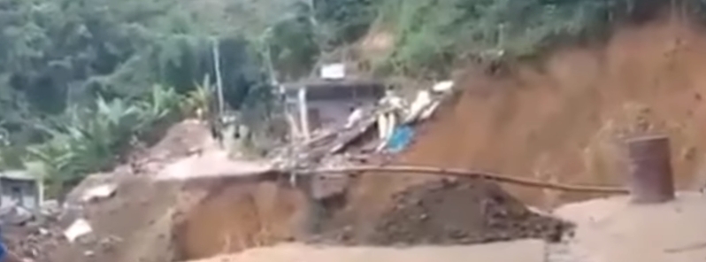 Massive landslide sweeps away mountain road in eastern Indonesia