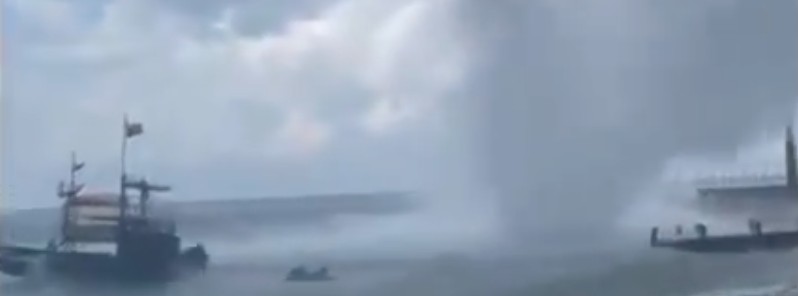 Close-up view of waterspout coming ashore in Novorossiysk, Russia