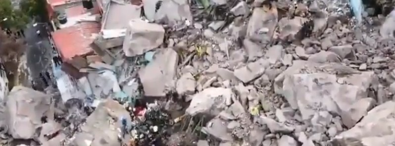 Huge boulders break off a mountain near Mexico City, plunging into a densely populated neighborhood