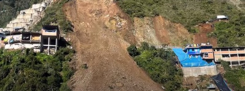 At least 60 homes buried after part of a hill collapses in northern Peru