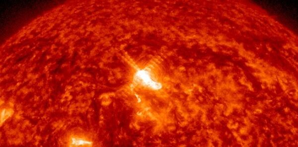 Double-peaked M6.3 solar flare erupts from AR 3213
