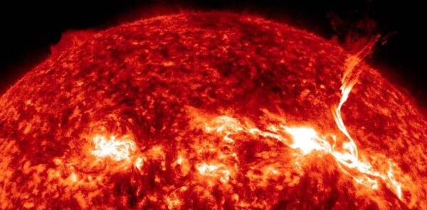 Long-duration M3.7 solar flare erupts from AR 3229, producing large coronal mass ejection