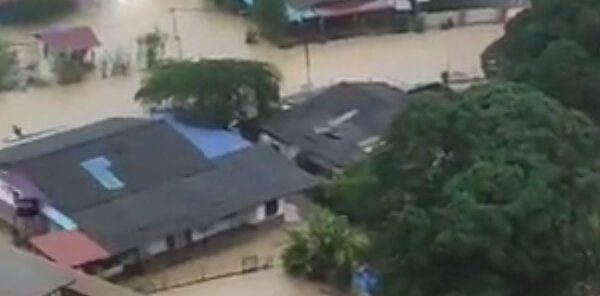 Floods submerge towns and villages in Malaysia, forcing mass evacuations