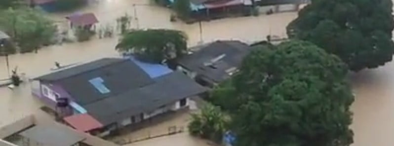Floods submerge towns and villages in Malaysia, forcing mass evacuations