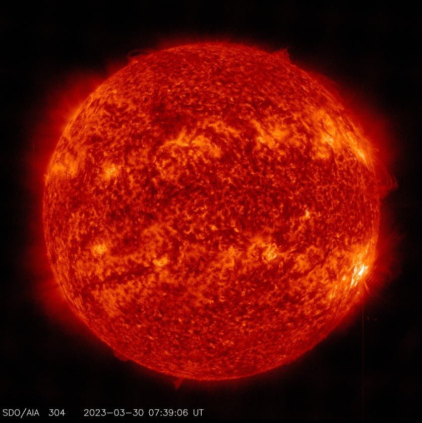 m5.4 solar flare march 30 2023 aia 304 bg