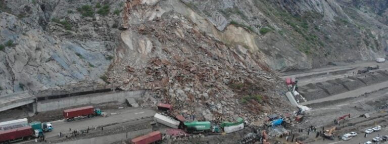 Massive landslide caused by lightning hits Pakistan, burying about two dozen trucks f