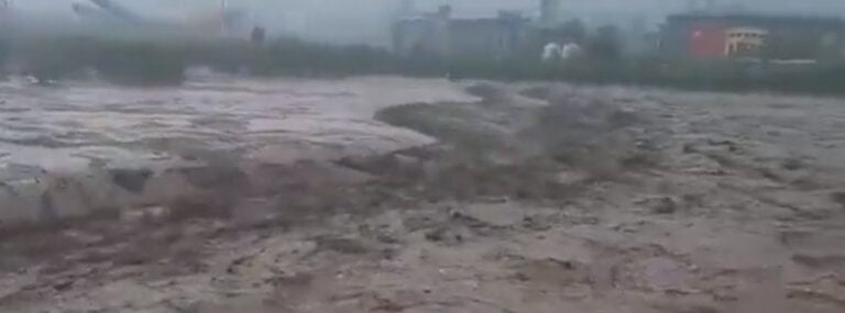 Record-breaking rainfall leads to severe flooding and two fatalities in Beijing, China