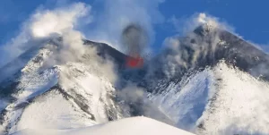 Strombolian explosions at snow-clad Etna volcano, Italy
