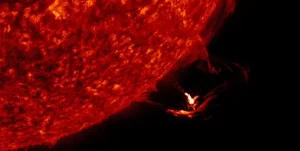 Proton flux rising after powerful farside eruption, S1 – Minor solar radiation storm