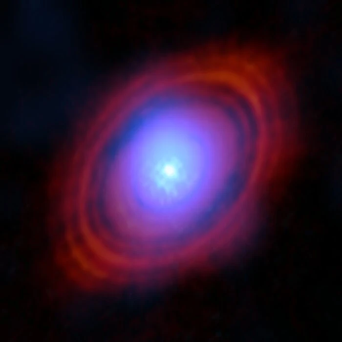 water vapour in a disc around a young star exactly where planets may be forming