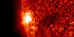 Strong M6.7 solar flare erupts from emerging region on SE limb
