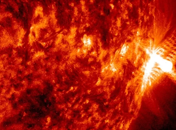 Long-duration M9.4 solar flare erupts from Region 3615