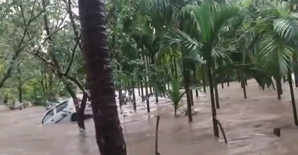 Car being washed away by flood waters in Karnataka's Hebri region