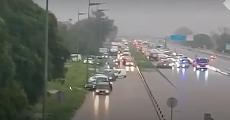 Cars stuck In floodwaters on the C-32 highway near Barcelona, Spain