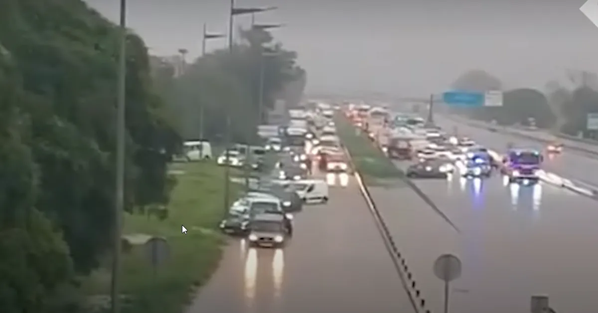 Cars stuck In floodwaters on the C-32 highway near Barcelona, Spain