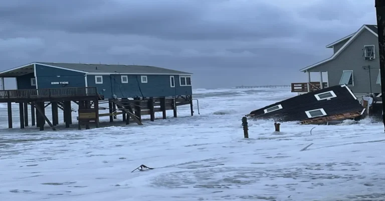 Portion of collapsed house in the water at Surf Side Drive in Rodanthe, North Carolina. NPS