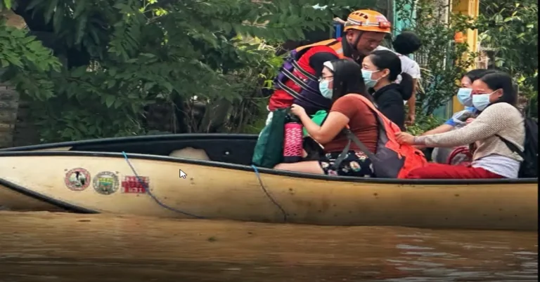 Rescue operative in the Cagayan province evacuating people using boats