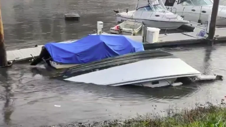 Boat flipped over at the Santa Cruz Harbor due to rough seas