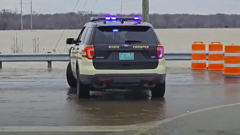 A state trooper vehicle on the flooded roads in Rives town in Tennessee on Sunday, February 16, 2025