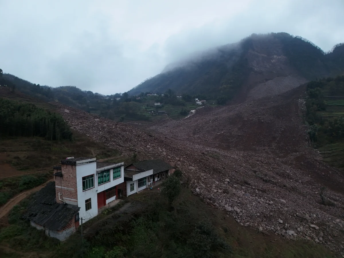 An aerial drone photo taken on February 8, 2025 shows the site of a landslide in Jinping Village