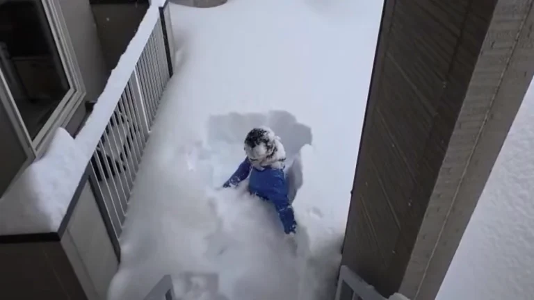 Man standing in snow in Hokkaido