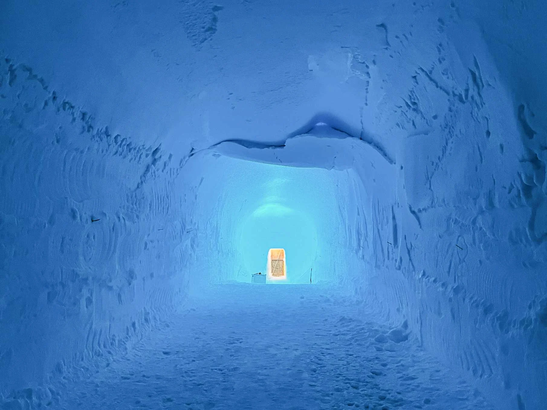 The view out the tunnel in the ice sheet that leads to the researchers' borehole