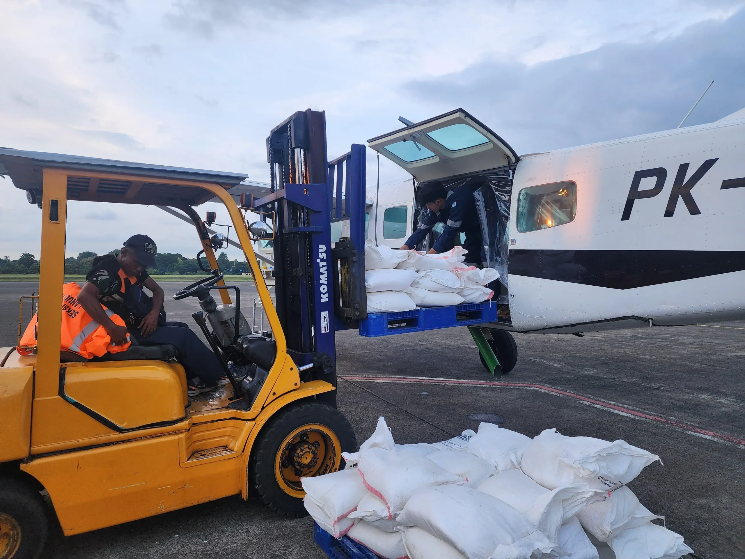 Officers are preparing seeding materials to be used in the Weather Modification Operation at Halim Perdanakusuma Airport, Jakarta on March 4, 2025