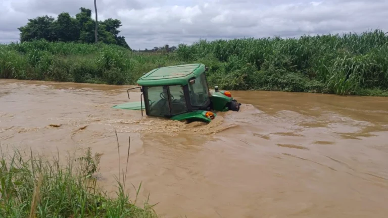Tractor drowned by floodwaters in Bolivia