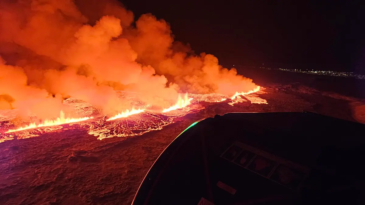 The 18 December 2023 eruption as photographed from a helicopter of the Icelandic Coast Guard. At the right in the background, Grindavík, Iceland, is visible. Image credit: Icelandic Meteorological Office