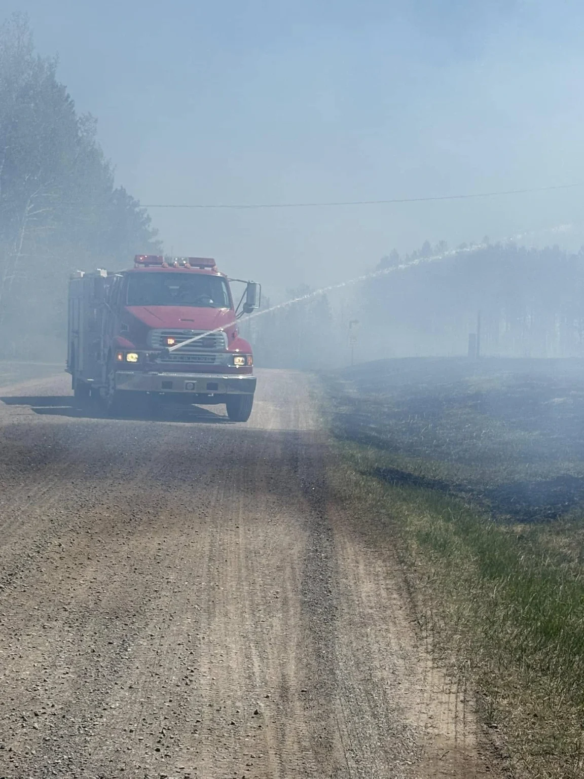 Fire truck engaging the Munger Shaw Fire on May 14, 2025. Image credit; Northland Fire Department.