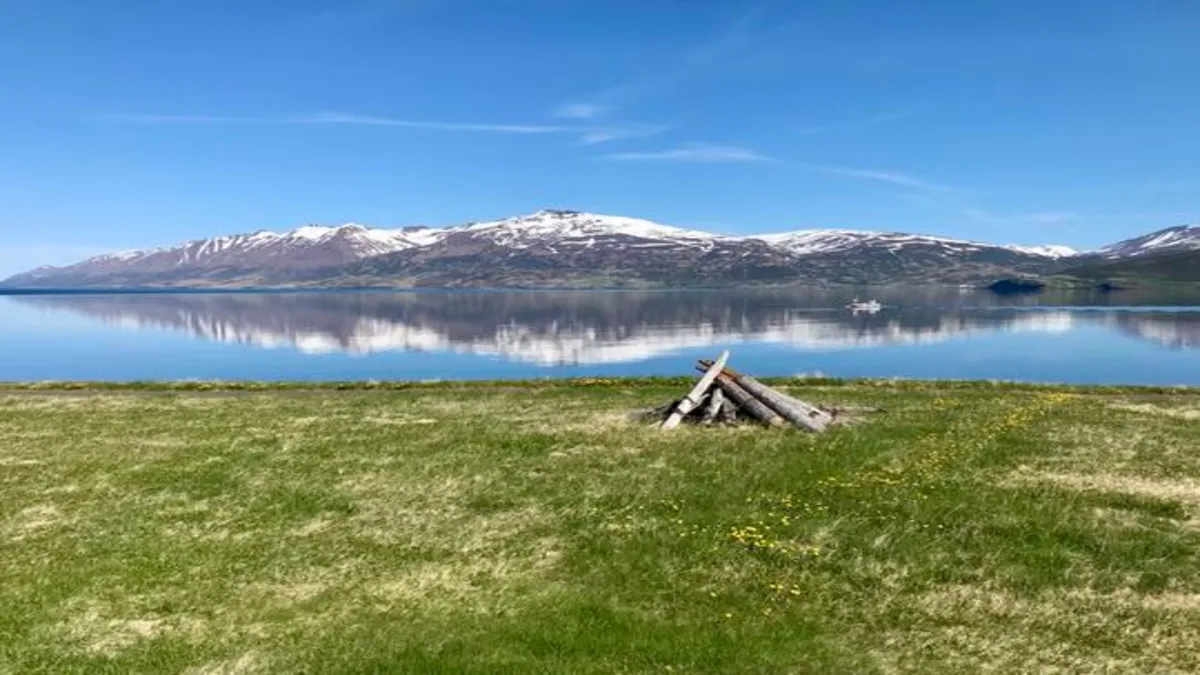Calm seas in Eyjafjörður near the town of Akureyri on May 17th, 2025. In the town of Akureyri which has more than 100 years of temperature measurements the average for the first 22 days of May 2025 is 10.9°C - by far the warmest on record for this period. (Photo: IMO/Haukur Haraldsson). Image credit: The Icelandic Meteorological Office