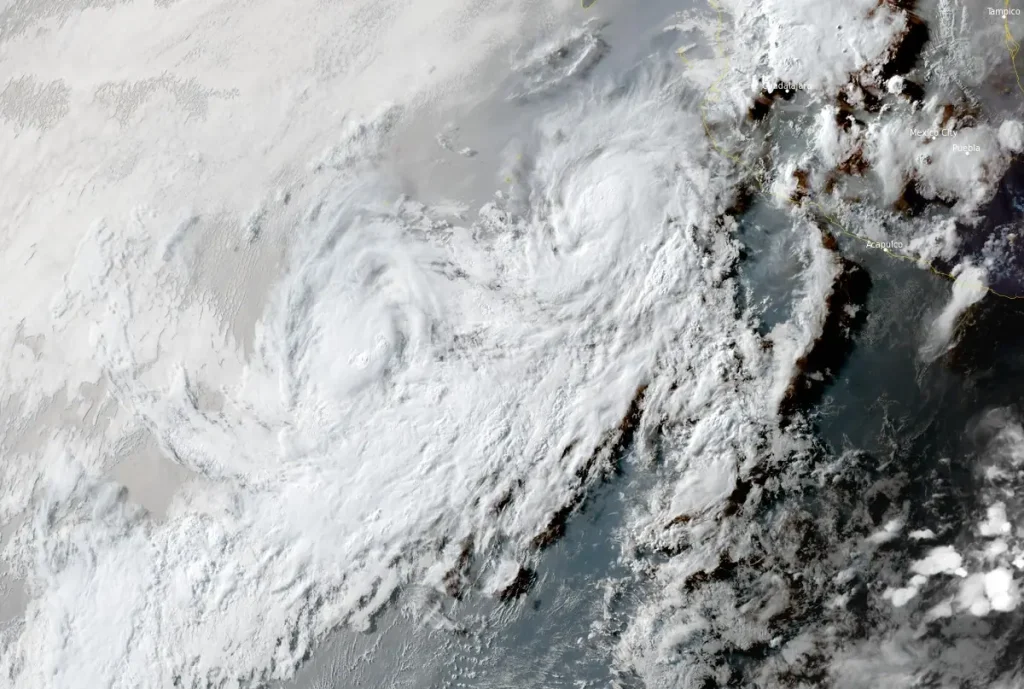 tropical storm cosme (left) and hurricane barbara (right) at 0030 utc on june 10 2025