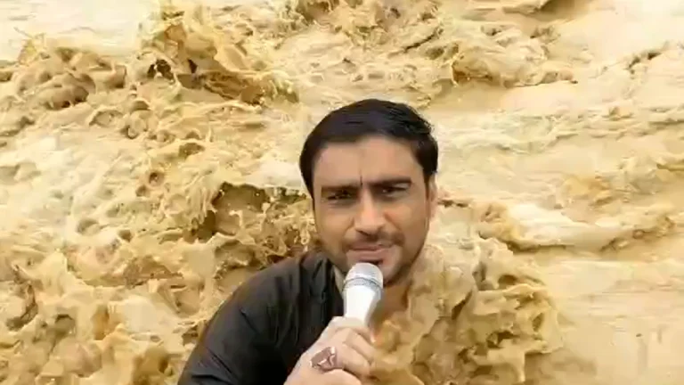 Pakistani Journalist Ali Musa Raza gets swept away by floodwaters in southern Punjab in July 2025. Credit: Ghulam Abbas
